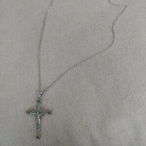 Two-sided Crucifix necklace. Jesus on one side Virgin Mother on the other.
